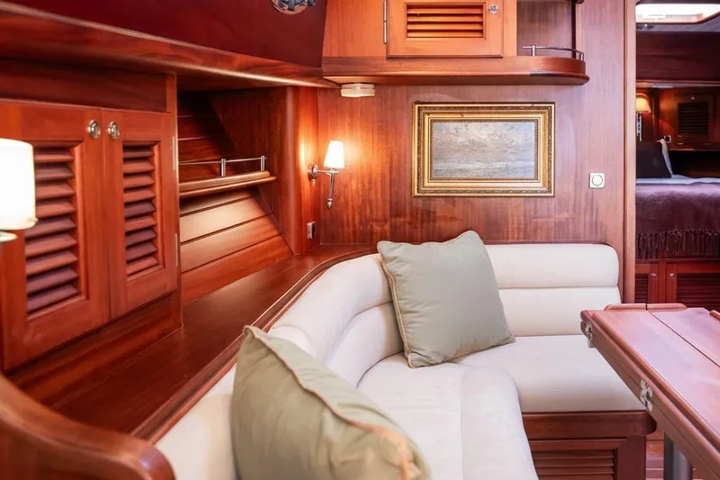 Grace Yacht Photos Pics Luxurious interior of 2007 Vicem 54 Classic Flybridge yacht with elegant wood finish.