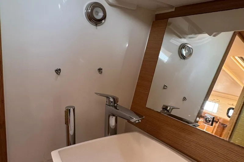 Insania Yacht Photos Pics Modern bathroom interior of 2019 Dufour 360 Grand Large yacht.