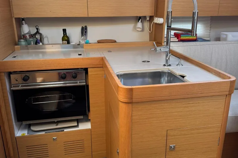 Insania Yacht Photos Pics Modern kitchen in 2019 Dufour 360 Grand Large yacht with oven and sink.