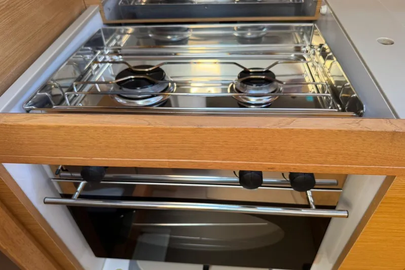 Insania Yacht Photos Pics Modern kitchen stove in 2019 Dufour 360 Grand Large yacht interior.