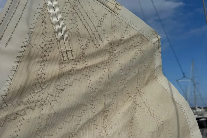 Insania Yacht Photos Pics Close-up of sail stitching on a 2019 Dufour 360 Grand Large yacht.