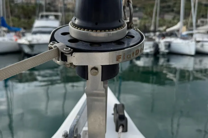 Insania Yacht Photos Pics Close-up of a 2019 Dufour 360 Grand Large sailboat's deck hardware in a marina.