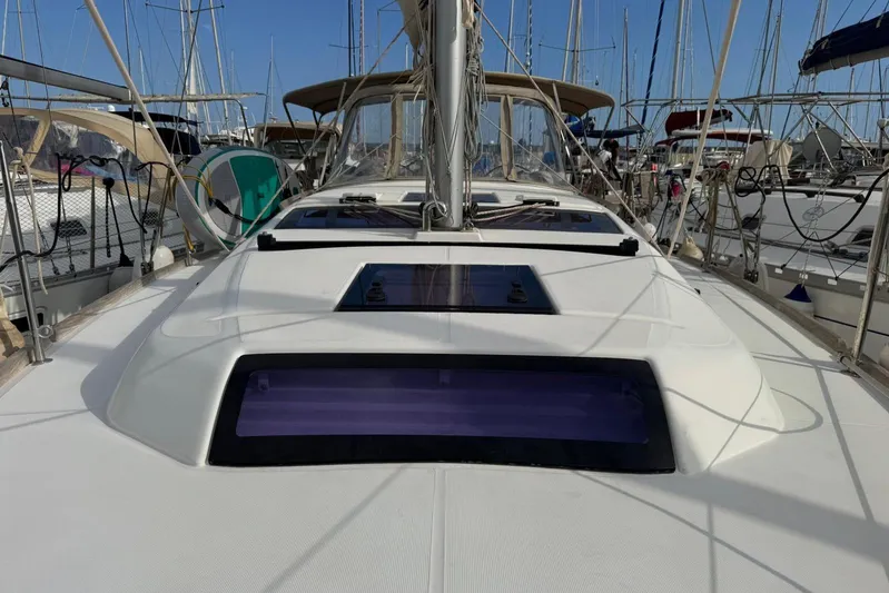 Insania Yacht Photos Pics 2019 Dufour 360 Grand Large yacht deck with marina background.