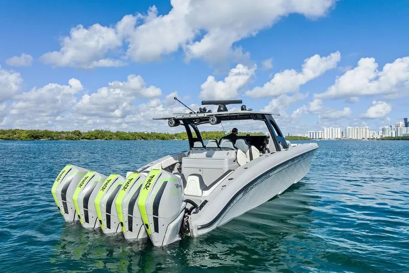 Trigger Yacht Photos Pics 2022 Midnight Express 43' Solstice boat with quad engines on open water.
