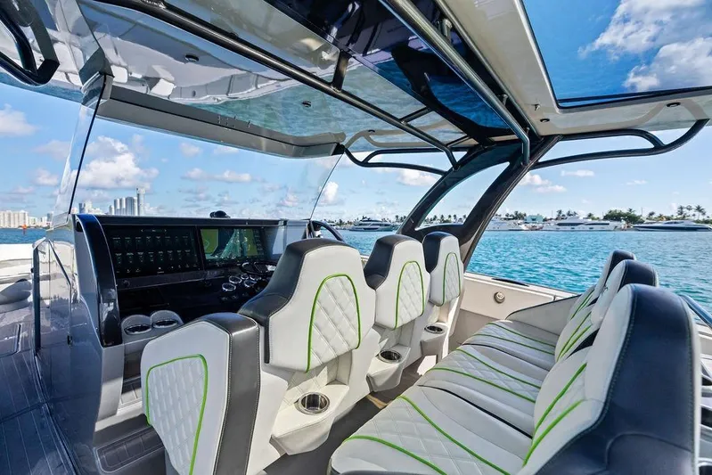 Trigger Yacht Photos Pics Interior of 2022 Midnight Express 43' Solstice boat with luxury seating and ocean view.