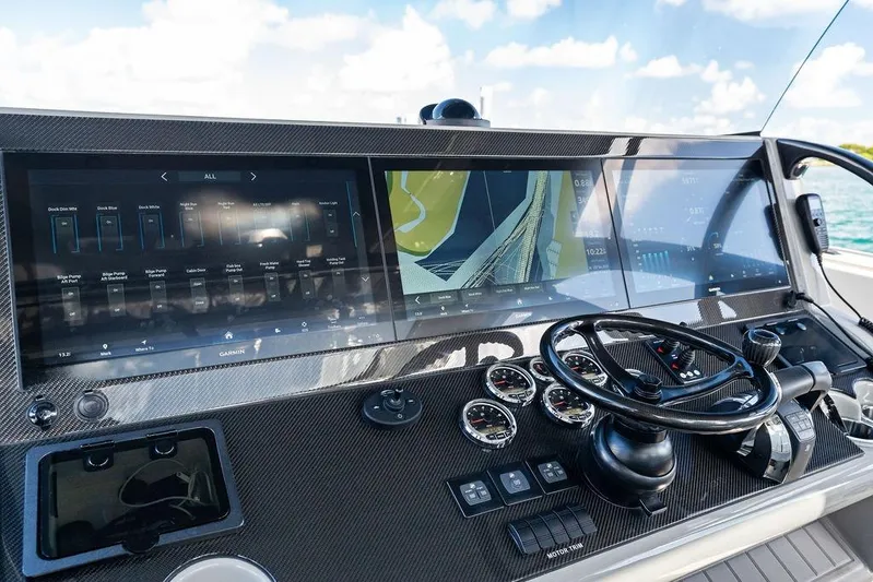 Trigger Yacht Photos Pics Dashboard of 2022 Midnight Express 43' Solstice boat with advanced navigation displays.