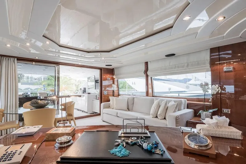 Let It Be Yacht Photos Pics Luxurious interior of 1998 Tecnomarine 118 yacht with elegant furnishings and modern decor.