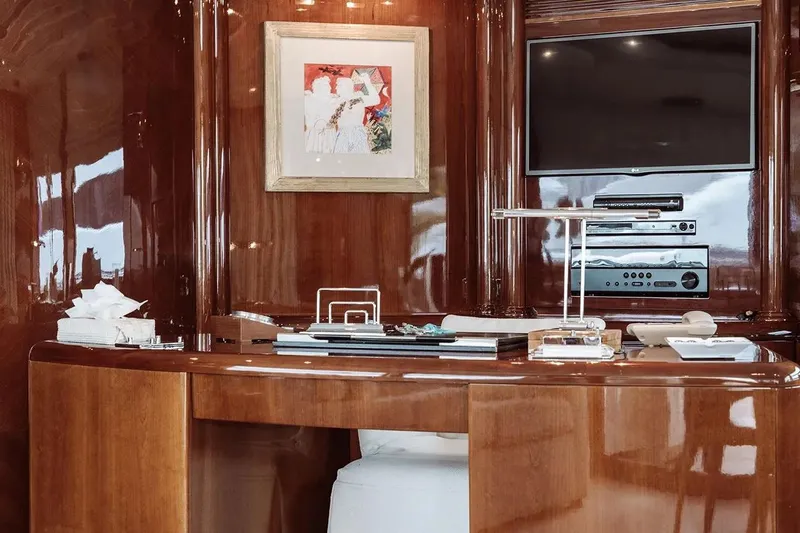 Let It Be Yacht Photos Pics Luxurious interior of 1998 Tecnomarine 118 yacht with polished wood and modern amenities.