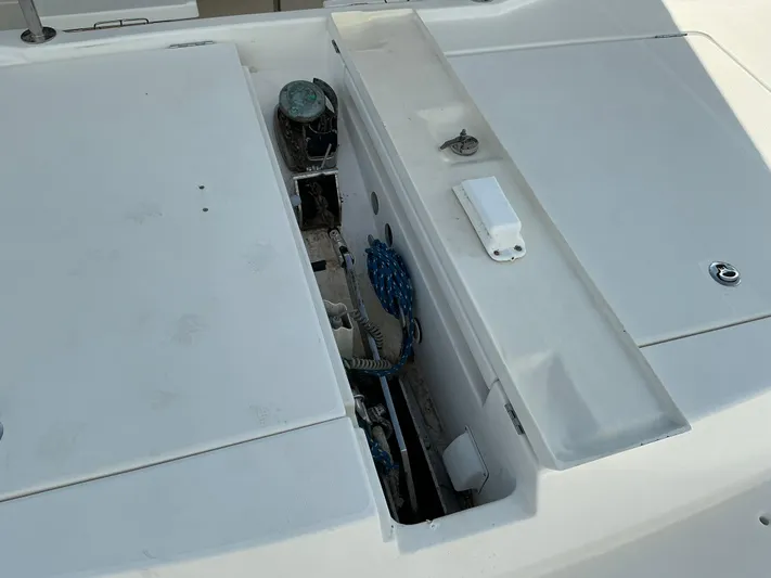 The Dance Yacht Photos Pics 2019 Leopard 51 Powercat deck with storage compartments and marine equipment.