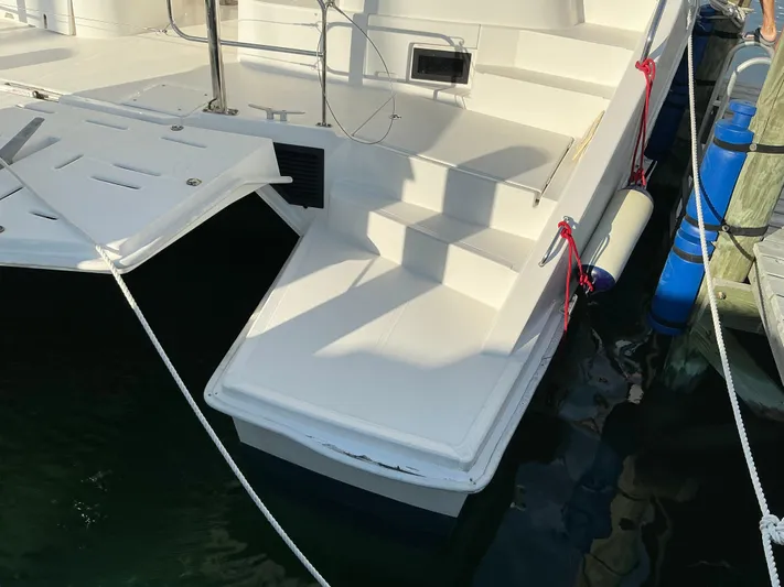 The Dance Yacht Photos Pics 2019 Leopard 51 Powercat yacht stern with steps and docked at marina.