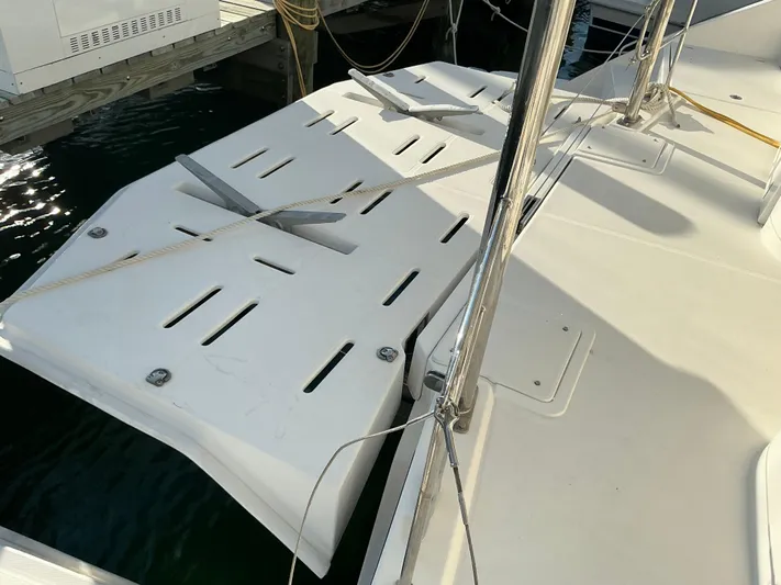 The Dance Yacht Photos Pics 2019 Leopard 51 Powercat deck with mooring ropes and water reflection.
