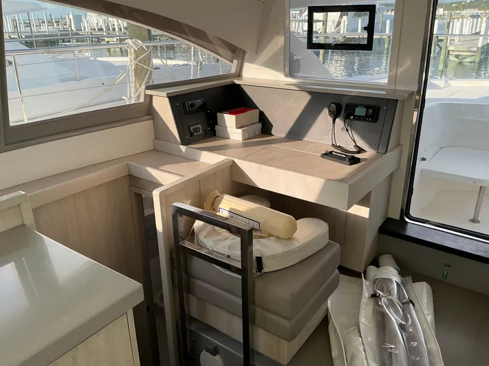 The Dance Yacht Photos Pics Interior of 2019 Leopard 51 Powercat yacht with modern helm station and seating.