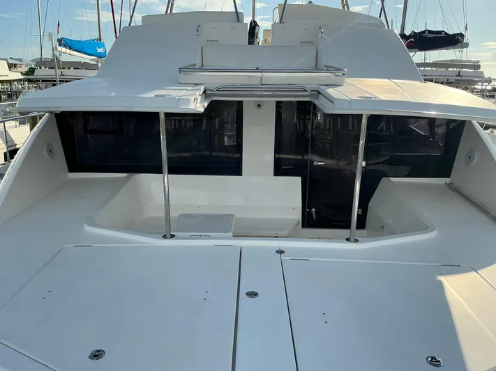 The Dance Yacht Photos Pics 2019 Leopard 51 Powercat yacht, rear deck view with sleek design and spacious layout.