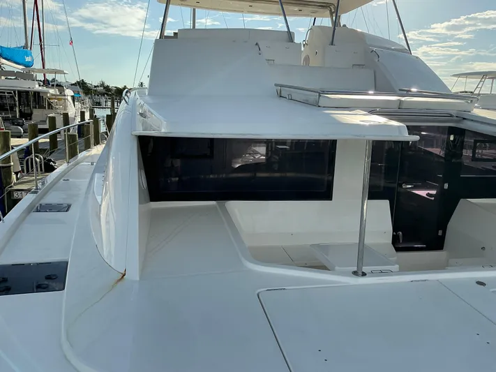 The Dance Yacht Photos Pics 2019 Leopard 51 Powercat yacht docked, showcasing sleek design and spacious deck area.