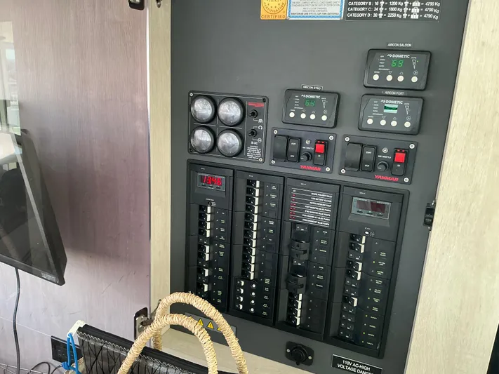 The Dance Yacht Photos Pics Electrical panel on a 2019 Leopard 51 Powercat yacht, featuring various switches and gauges.