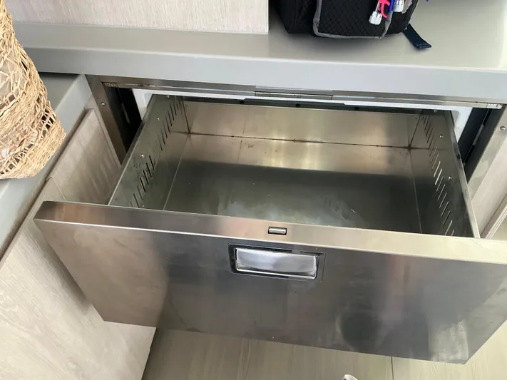 The Dance Yacht Photos Pics Open stainless steel drawer in Leopard 51 Powercat 2019 kitchen area.