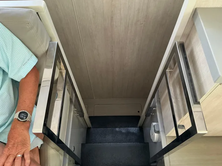 The Dance Yacht Photos Pics Staircase inside 2019 Leopard 51 Powercat yacht with modern railing design.