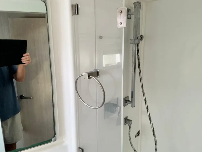 The Dance Yacht Photos Pics Bathroom interior of 2019 Leopard 51 Powercat with modern shower fixtures.