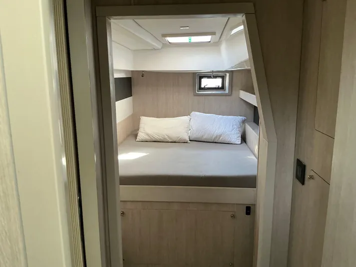 The Dance Yacht Photos Pics 2019 Leopard 51 Powercat cabin interior with bed and pillows.