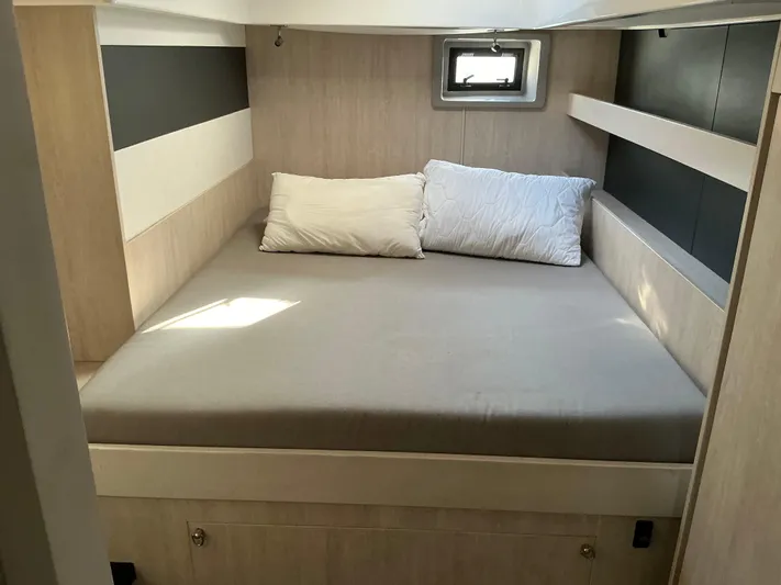The Dance Yacht Photos Pics Cozy bedroom interior of 2019 Leopard 51 Powercat with modern design and natural light.
