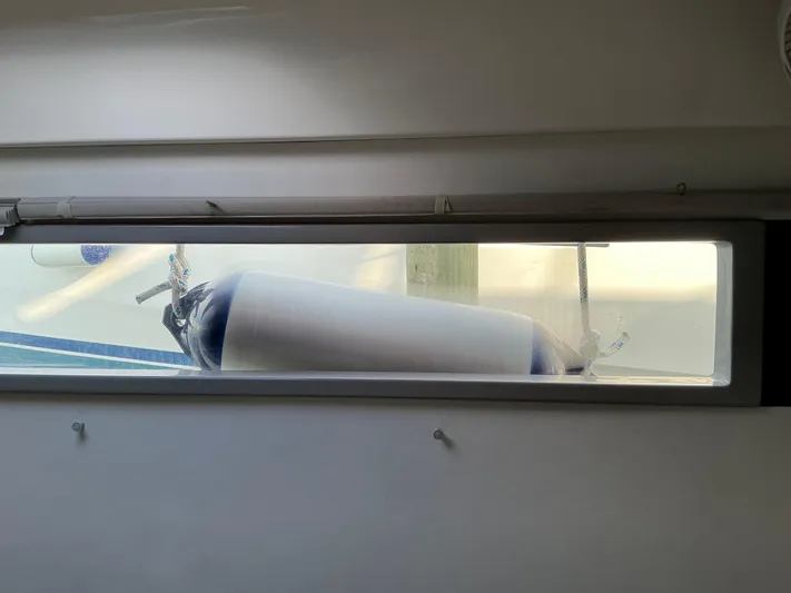 The Dance Yacht Photos Pics View from Leopard 51 Powercat 2019 window showing a boat fender outside.