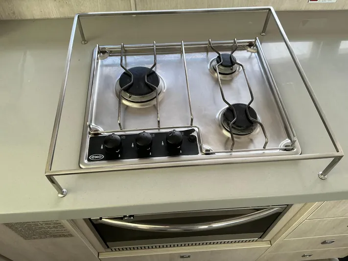 The Dance Yacht Photos Pics Stainless steel three-burner stove on a 2019 Leopard 51 Powercat yacht.