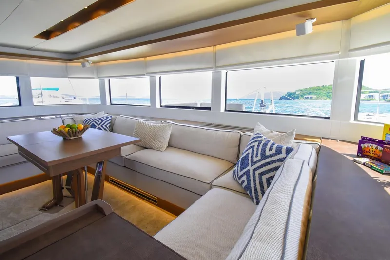  Yacht Photos Pics Luxurious interior of 2021 Lagoon 50 yacht with elegant seating and ocean view.