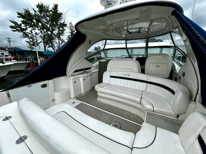  Yacht Photos Pics 2010 Sea Ray 40 Sundancer yacht interior with white seating and sleek design.