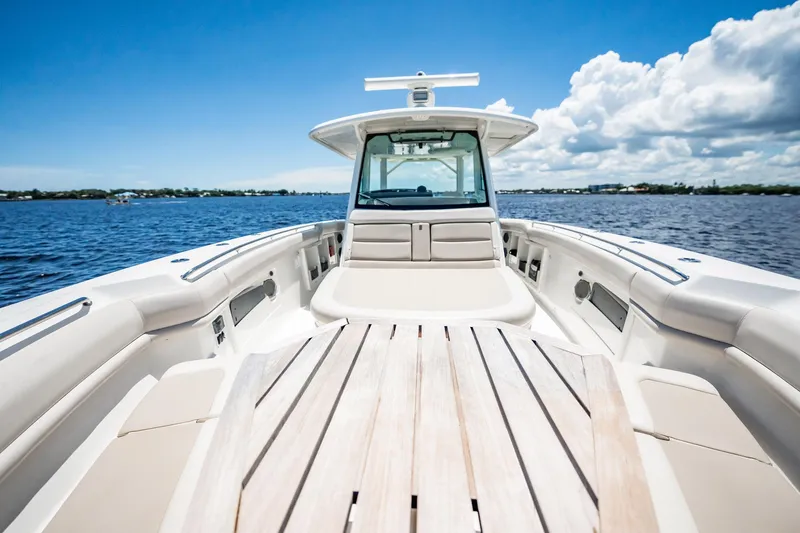 Crushed It Yacht Photos Pics 2018 Boston Whaler 380 Outrage boat on calm water under blue sky.