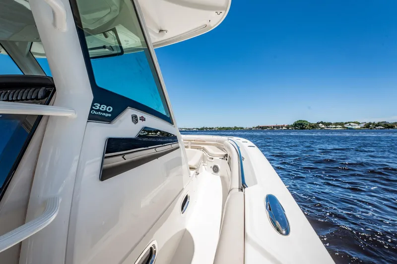 Crushed It Yacht Photos Pics 2018 Boston Whaler 380 Outrage boat cruising on a sunny day.