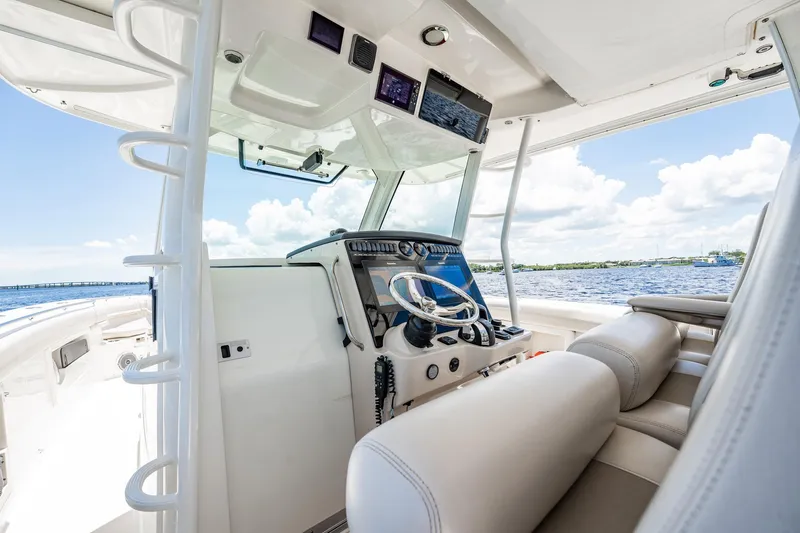 Crushed It Yacht Photos Pics 2018 Boston Whaler 380 Outrage helm with modern controls and ocean view.