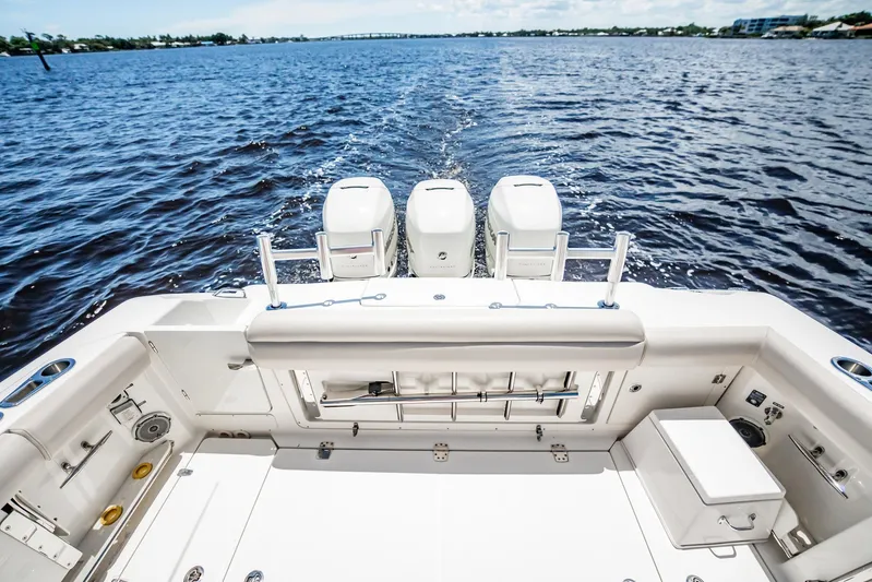 Crushed It Yacht Photos Pics 2018 Boston Whaler 380 Outrage boat with triple engines on open water.