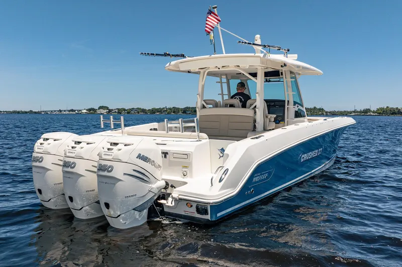 Crushed It Yacht Photos Pics 2018 Boston Whaler 380 Outrage boat with triple Mercury engines on open water.