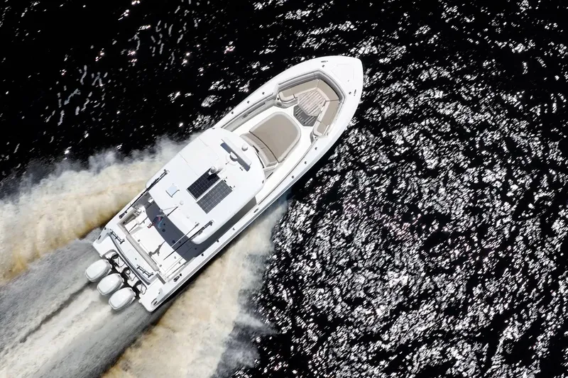 Crushed It Yacht Photos Pics Aerial view of 2018 Boston Whaler 380 Outrage speeding on water.