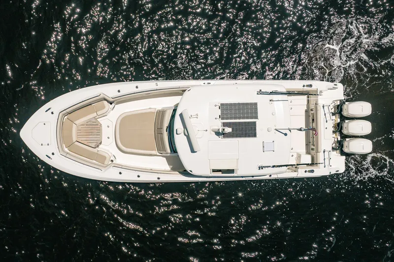 Crushed It Yacht Photos Pics Aerial view of 2018 Boston Whaler 380 Outrage boat cruising on water.