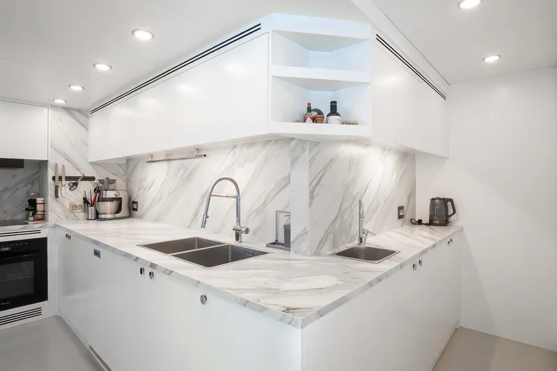 Ray Yacht Photos Pics Modern Galley interior on 2025 Numarine 32 XP yacht