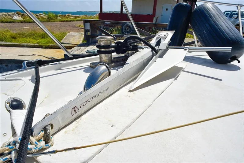  Yacht Photos Pics 1987 Hatteras Sportfish boat deck with anchor and winch system.