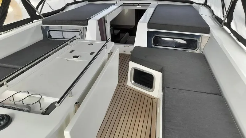 1725 Yacht Photos Pics Interior view of 2022 Beneteau Oceanis 51.1 yacht with sleek seating and modern design.