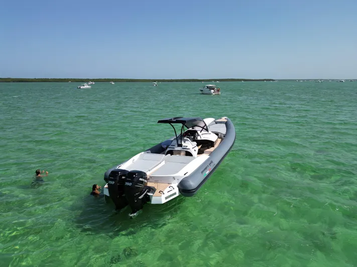  Yacht Photos Pics 2025 Panamera Yacht PY 100 in clear turquoise waters.