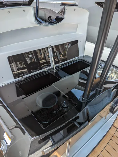  Yacht Photos Pics Modern kitchen area on the 2025 Panamera Yacht PY 100 with sleek black appliances.