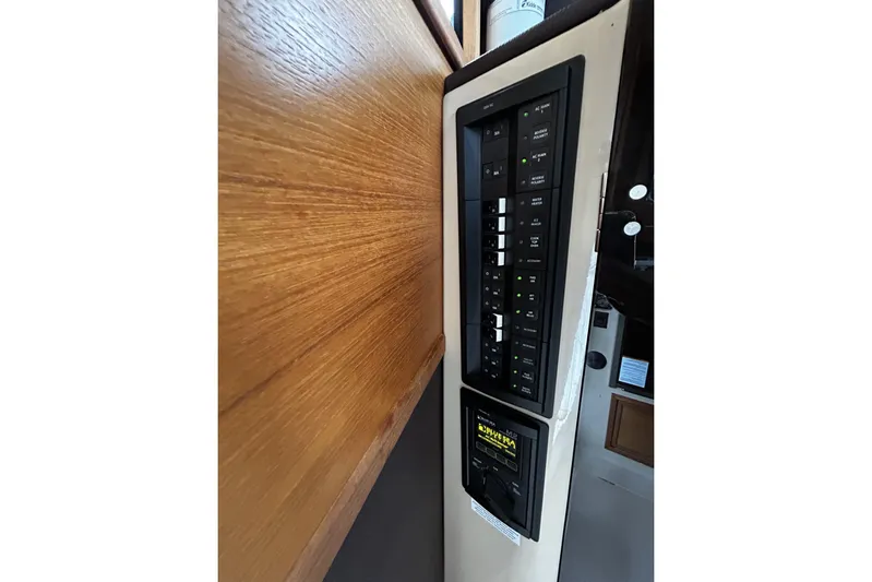 Sequel Yacht Photos Pics Control panel of 2015 Ranger Tugs R-31 CB boat, featuring switches and indicators.