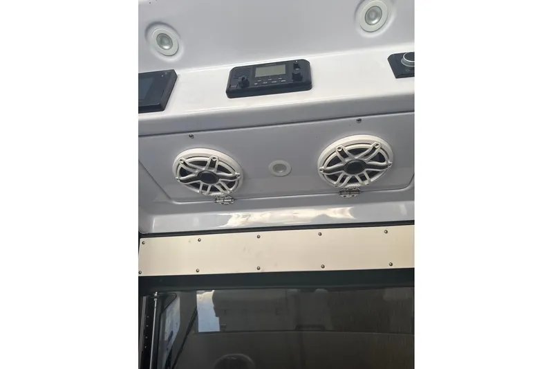 Hat Trick Yacht Photos Pics JL Speakers at helm