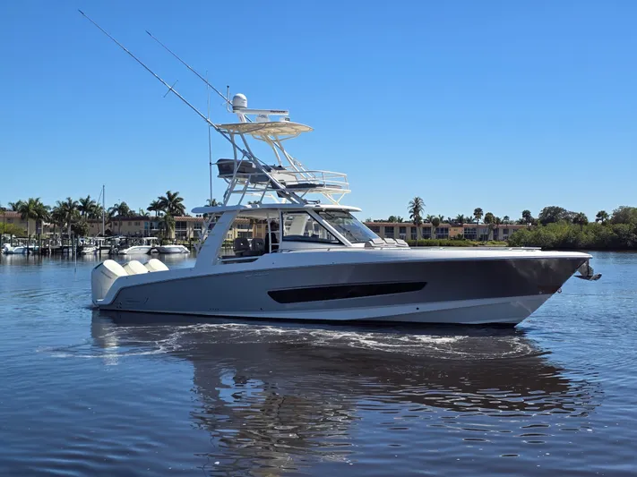  Yacht Photos Pics 2023 Boston Whaler 420 Outrage on calm water.