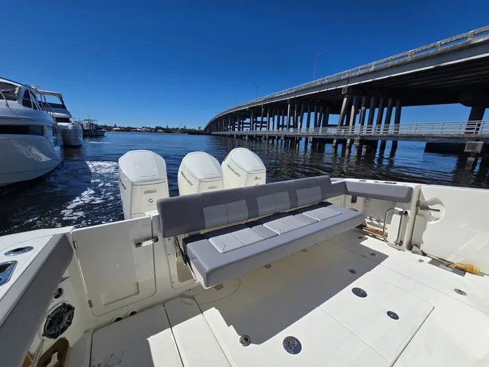  Yacht Photos Pics Boston Whaler 420 Outrage 2023 with bridge in background.