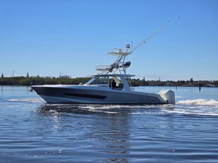  Yacht Photos Pics 2023 Boston Whaler 420 Outrage on calm waters.