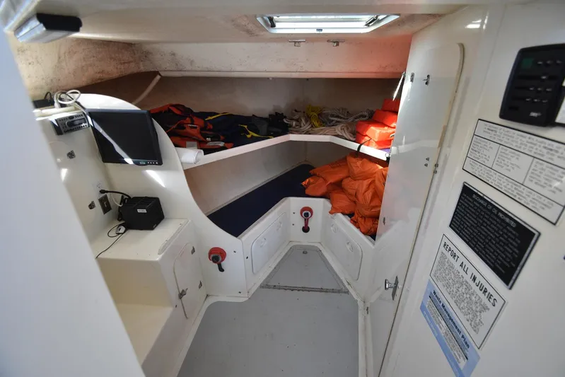 Ocean Explorer Yacht Photos Pics Interior of a 2006 Custom 45 Doucette boat with safety equipment and control panel.
