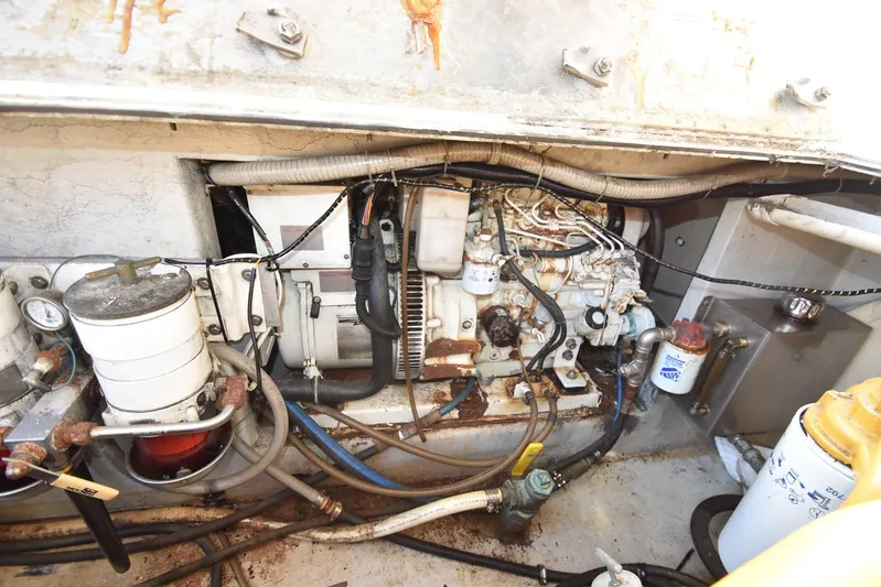 Ocean Explorer Yacht Photos Pics Engine compartment of a 2006 Custom 45 Doucette boat, showing various mechanical components.