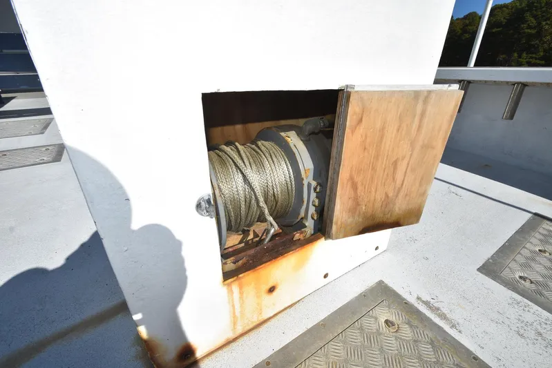 Ocean Explorer Yacht Photos Pics Rope winch inside a compartment on a 2006 Custom 45 Doucette boat.