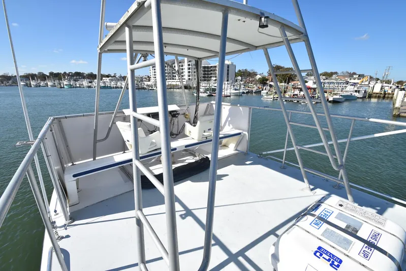 Ocean Explorer Yacht Photos Pics Custom 45 Doucette boat, 2006 model, docked in a marina with clear skies.