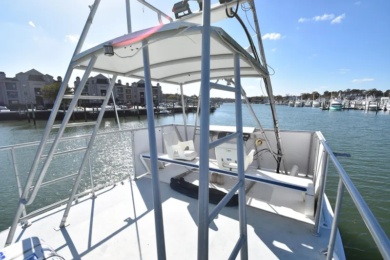 Ocean Explorer Yacht Photos Pics Custom 45 Doucette boat on calm water near marina, clear sky, 2006 model.
